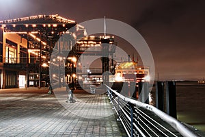 New Orleans riverwalk at night.