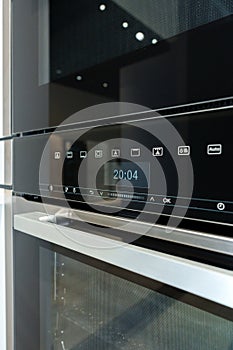 New ovens in household appliance section in store close up