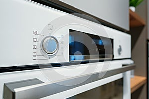 New ovens in household appliance section in store close up