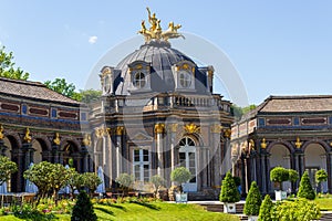 New palace (sun temple) with statues in park at Hermitage (Eremitage) Museum in Bayreuth, Bavaria, Germany