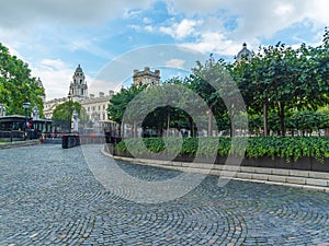 The New Palace Yard and the garden of the Westminster Palace and the Houses of Parliament, London, UK.