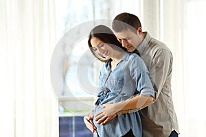 New parents enjoying pregnancy photo