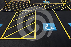 A new parking lot with stalls reserved for handicapped parking