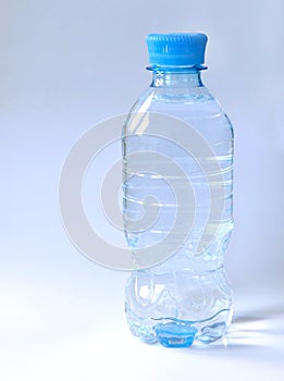 New plastic bottle full of clean drinking water