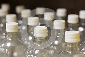 New plastic bottles with lids for filling water and beverages