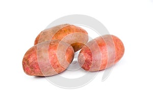 New potato tuber heap isolated on white background cutout