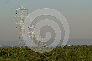 New power lines in construction during dusk time, wiring work