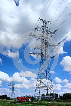 New power pole on the background of clouds