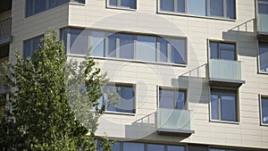 New prefab house. Apartments in panel houses. The facade of a residential modern building with balconies and windows