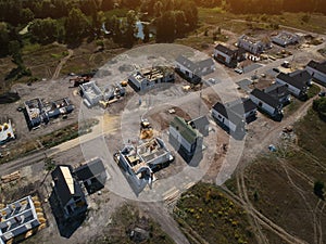 New private housing development construction in rural countryside aerial view