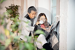 New property owners, young couple moving to new home, apartment, look happy