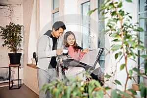 New property owners, young couple moving to new home, apartment, look happy