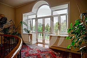 New pvc windows in old-styled interior