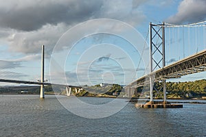 The new Queensferry Crossing bridge over the Firth of Forth with the older Forth Road bridge in Edinburgh Scotland