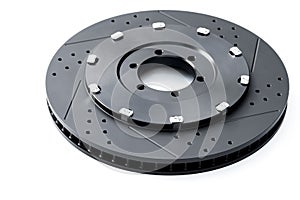 NEW Racing car brake disc - Black ventilated brake discs on a white background. The rotor is the rotating part of a wheel`s disc b