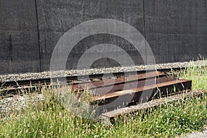 New railroad ties next to tracks