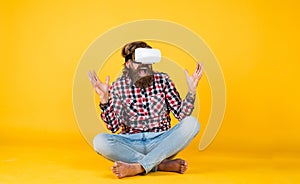 New reality is here. happy future. man wear wireless VR glasses. guy in VR headset. bearded hipster use modern