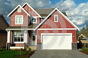 New Red House Home With White Trim