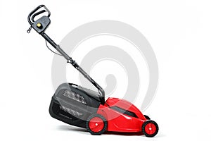 New red lawnmower on white background