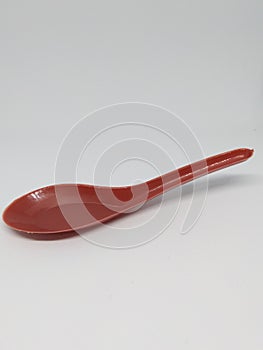 The new red plastic spoon is very hygienic