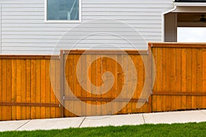 New Red Stained Garden Wood Fence Construction