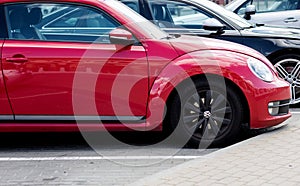 new red Volkswagen Beetle