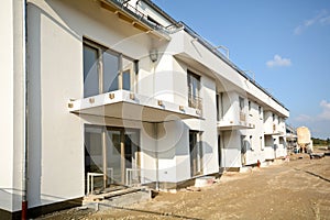 New residential building with facade and balconies - Construction work near completion