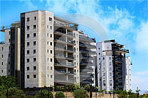 New residential buildings in Israel. Apartments with sunny balconies in a new area in Israel. Modern israeli residential buildings