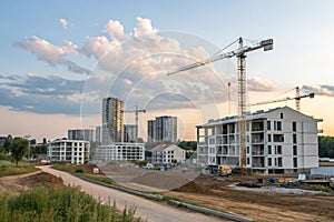 New residential complex under construction with cranes