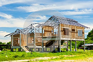 New residential construction house framing against a blue sky an