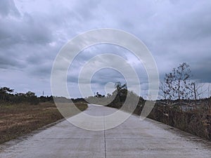 New road on the edge of the forest, Balang Island, Indonesia