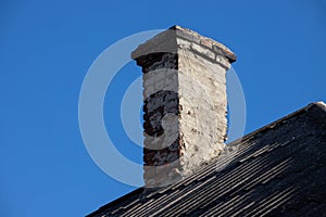 New roofing construction with attic skylights, rain gutter system, roof windows and roof protection from snow board