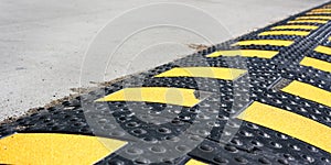 New rubber speed bump of black colour with yellow stripes