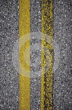 New and rusty yellow road lines