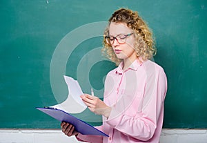 New school year. Girl prepare for exams. teacher with document folder. Business school. girl teacher at school lesson