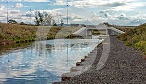New section of the Stroudwater Navigation at Whitminster passing under the A39 road, UK