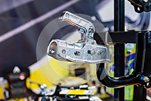 New and shiny trailer hitch or towbar at car accessories store