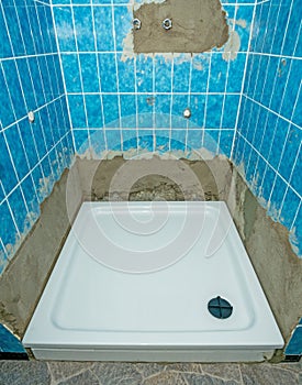 A new shower basin installation and renovation