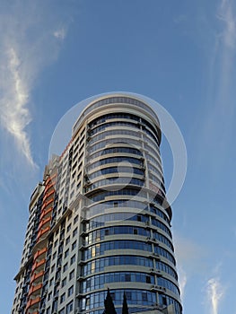 New skyscraper against blue sky