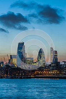 New skyscrapers of the City of London at sunset 2014 photo