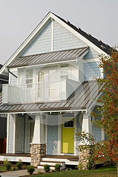 House Home Bright Yellow Door Exterior Front Elevation Rockwork Roof Details