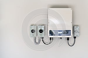 Solar panel inverter attached to the wall