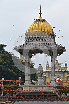New State Circle statue of maharadja Chamarajendar Wodeyar Mysore palace Karnataka India photo