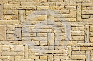 New stone cladding plates on the wall