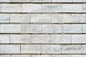 Old stone cladding plates on the wall closeup