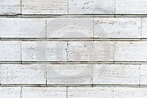 Old stone cladding plates on the wall closeup