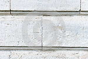 Old stone cladding plates on the wall closeup