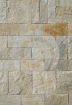 New stone wall closeup in sun