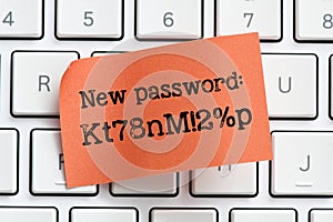 New strong password words on a red sheet of paper placed on a computer keyboard. It`s time to change your password