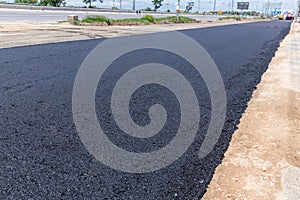 New tarmac road. New asphalt abstract texture background. empty asphalt road. New asphalt texture
